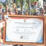 Kapolres Barito Utara Terima Penghargaan dari Gubernur Kalteng atas Keberhasilan Amankan Pilkada