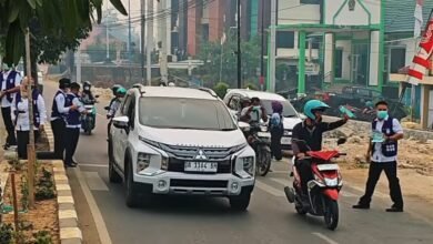 Bagikan Masker untuk Pengendara Antisipasi Kabut Asap Bagikan Masker untuk Pengendara Antisipasi Kabut Asap